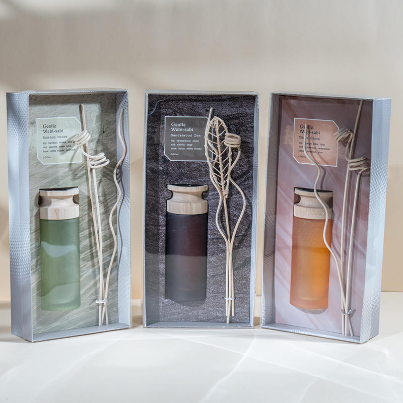 Diffuseur à roseaux haut de gamme en flacon de verre cylindrique haut de gamme avec vendeur de diffuseur d'arôme en bâton en bois
