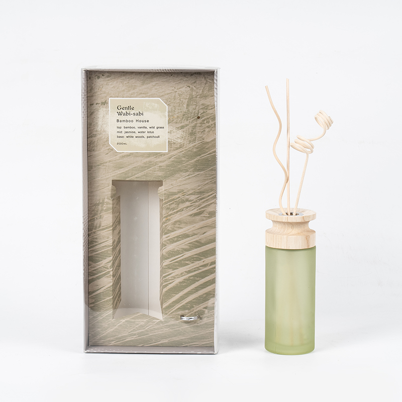 Diffuseur à roseaux haut de gamme en flacon de verre cylindrique haut de gamme avec vendeur de diffuseur d'arôme en bâton en bois
